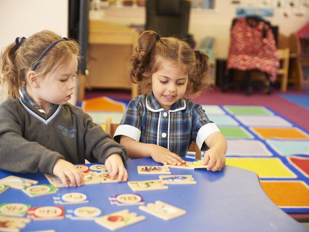 nursery children doing puzzles