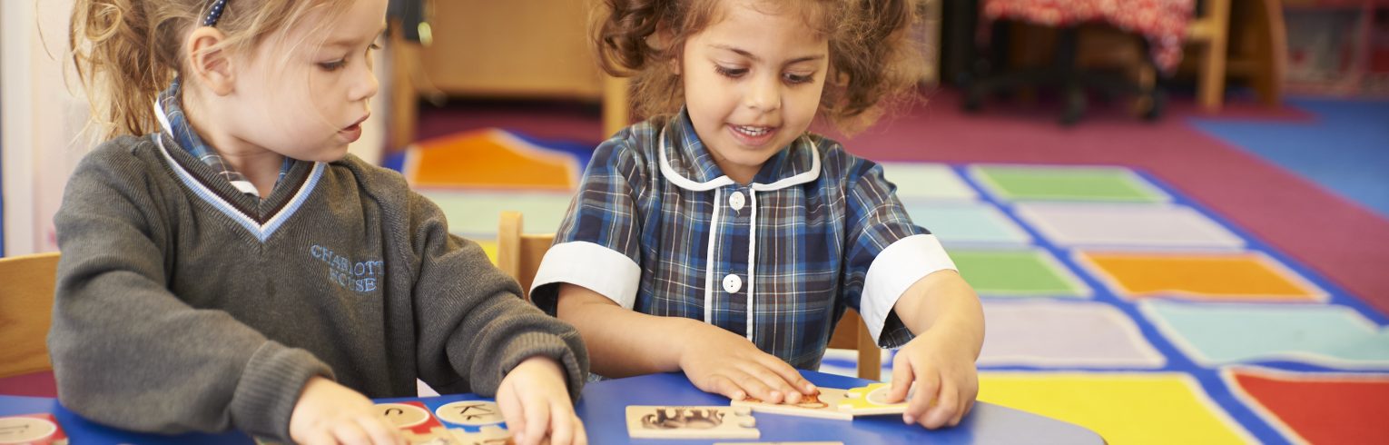 nursery children doing puzzles