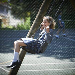 girl on swings